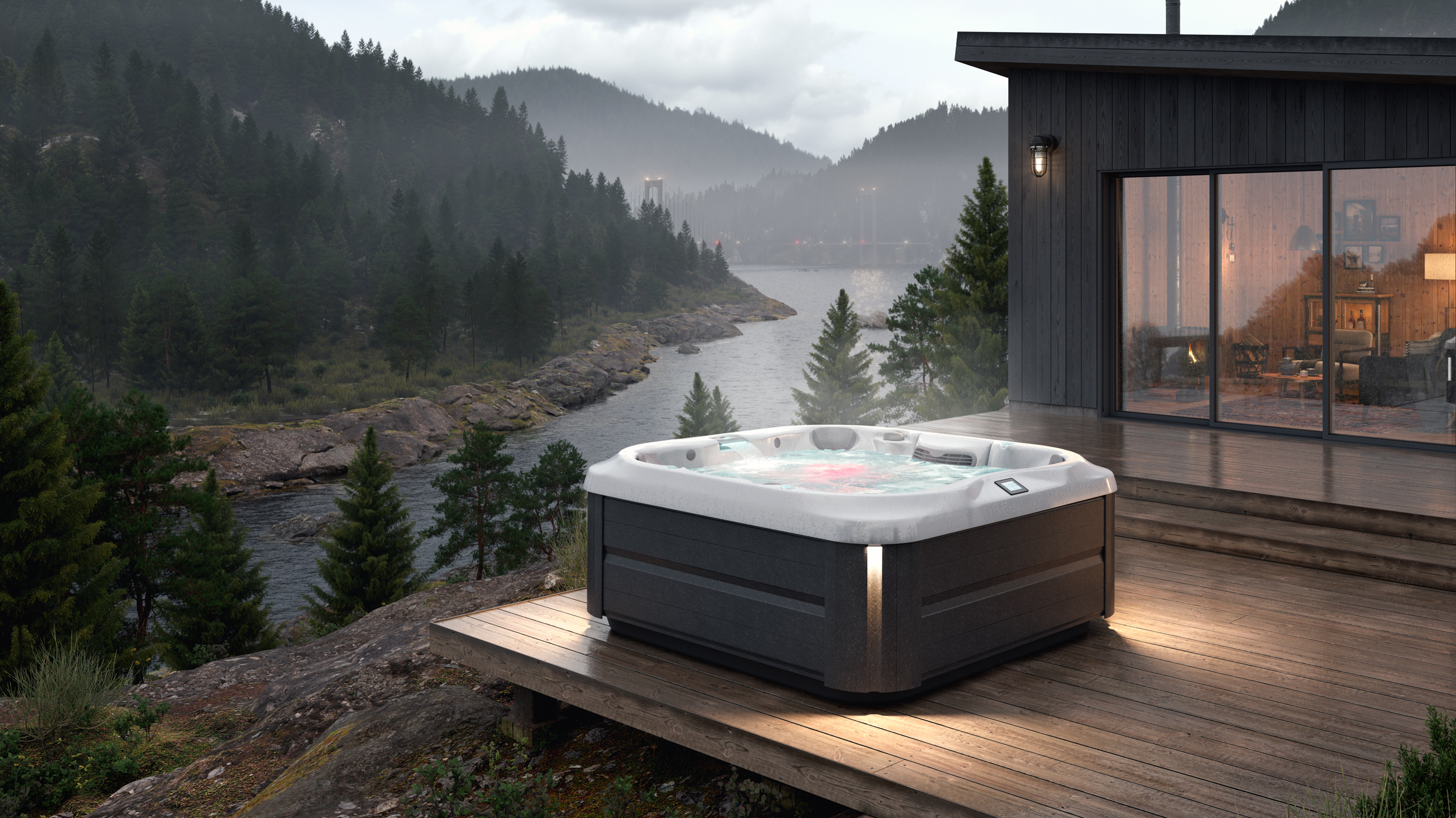 J-345 hot tub on a porch overlooking a picturesque view of mountainsand river