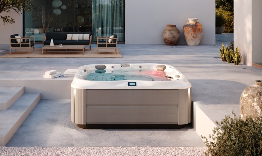 J-375 with IR lights hot tub in a spacious residential yard