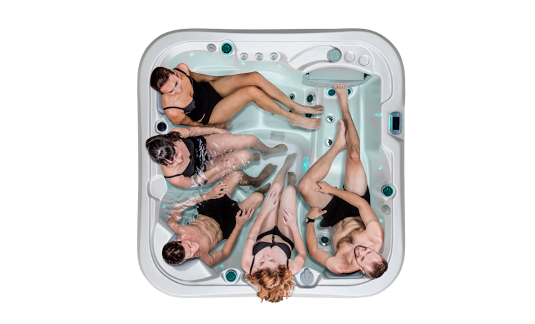 Top down view of Vortex Mercury with 5 people enjoying the spa pool