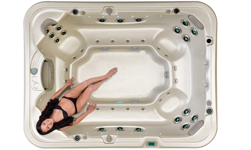 Top view of Vortex Titanium with a woman enjoying the neck and shoulder therapy seat