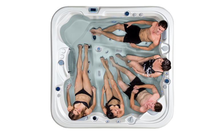 Top down view of the Vortex Nitro with 5 people enjoying ths spa pool