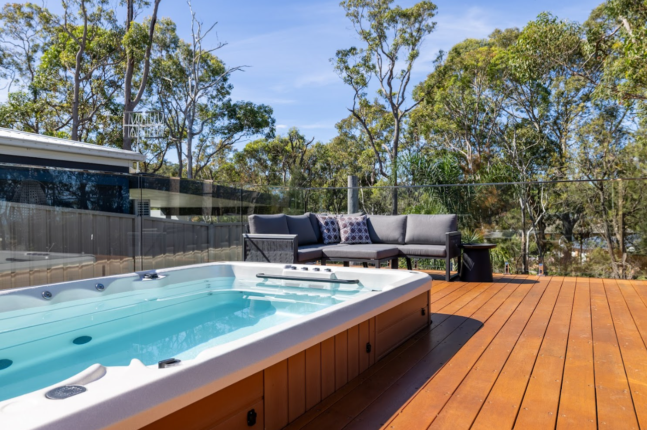 Swim spa in a beautiful outdoor setting