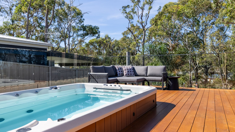 Swim spa in a beautiful outdoor setting