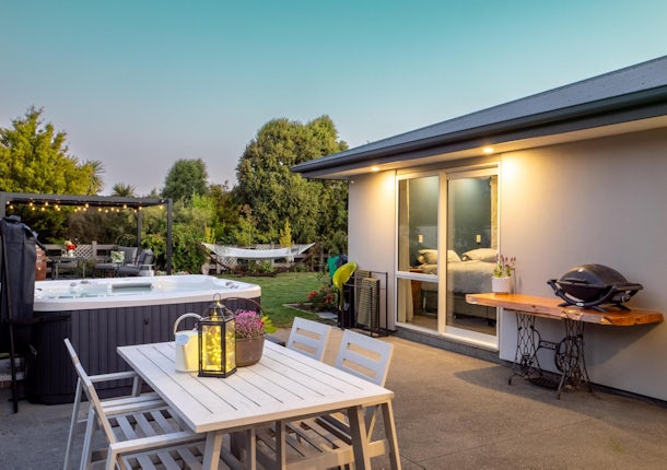 patio dining beside spa