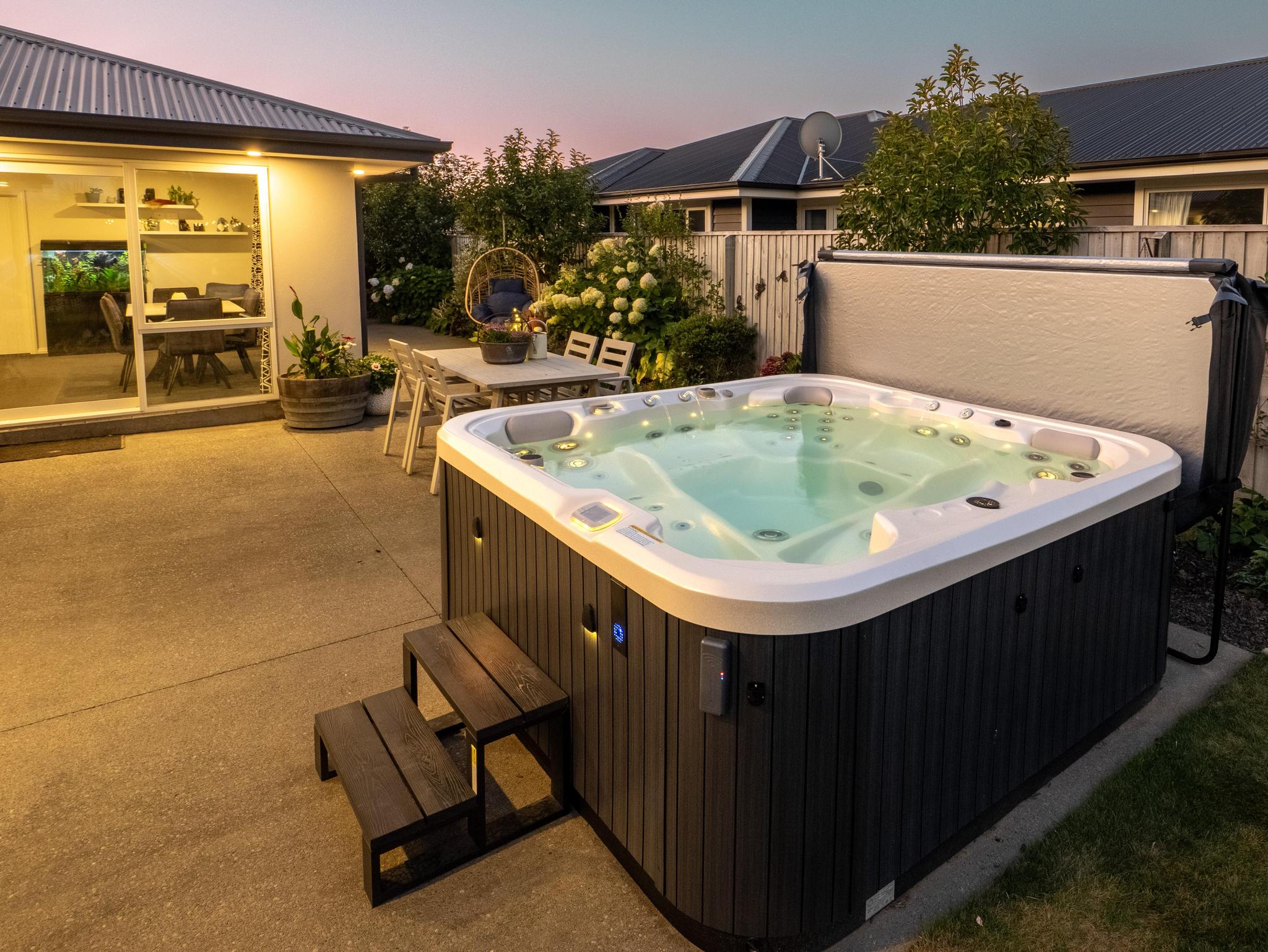 beautiful outside setting with a spa pool
