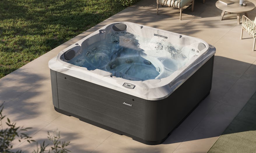 J-201 hot tub in a backyard patio