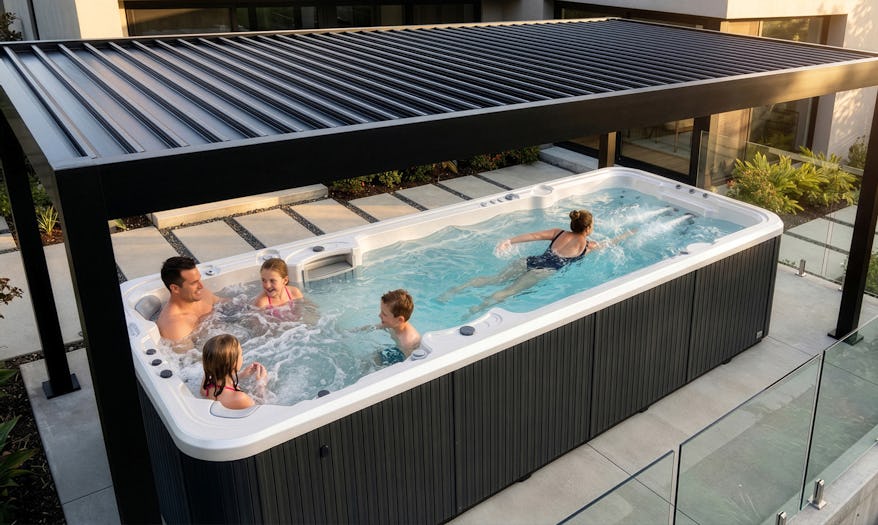 Family enjoying bonding in an Aqyagym Max that is shaded by the 4800XT pergola