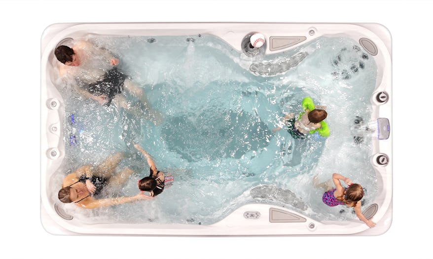 Top down view of a family enjoying the J-13 Power Play swim spa