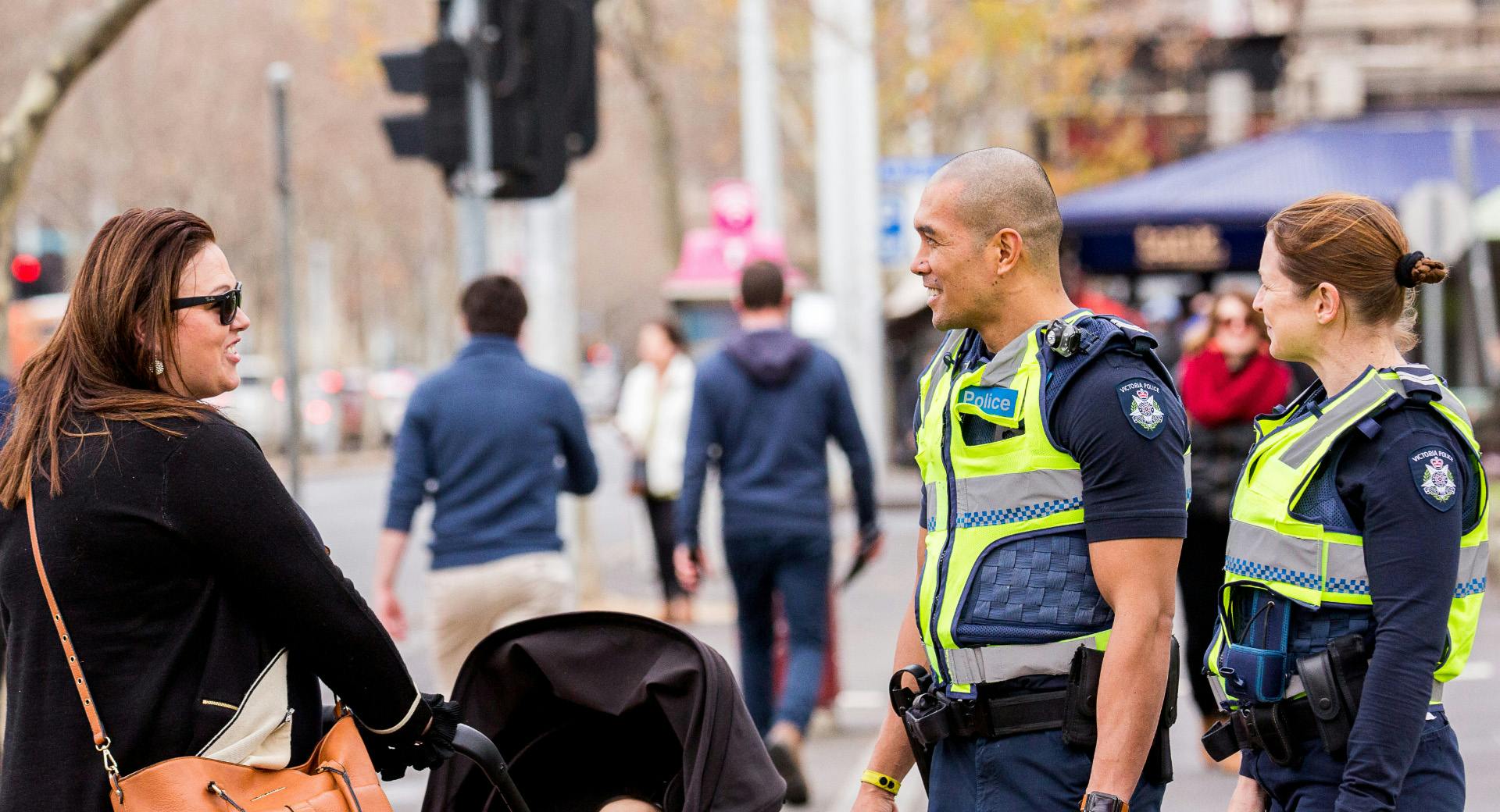 Police talking to citizen on the street