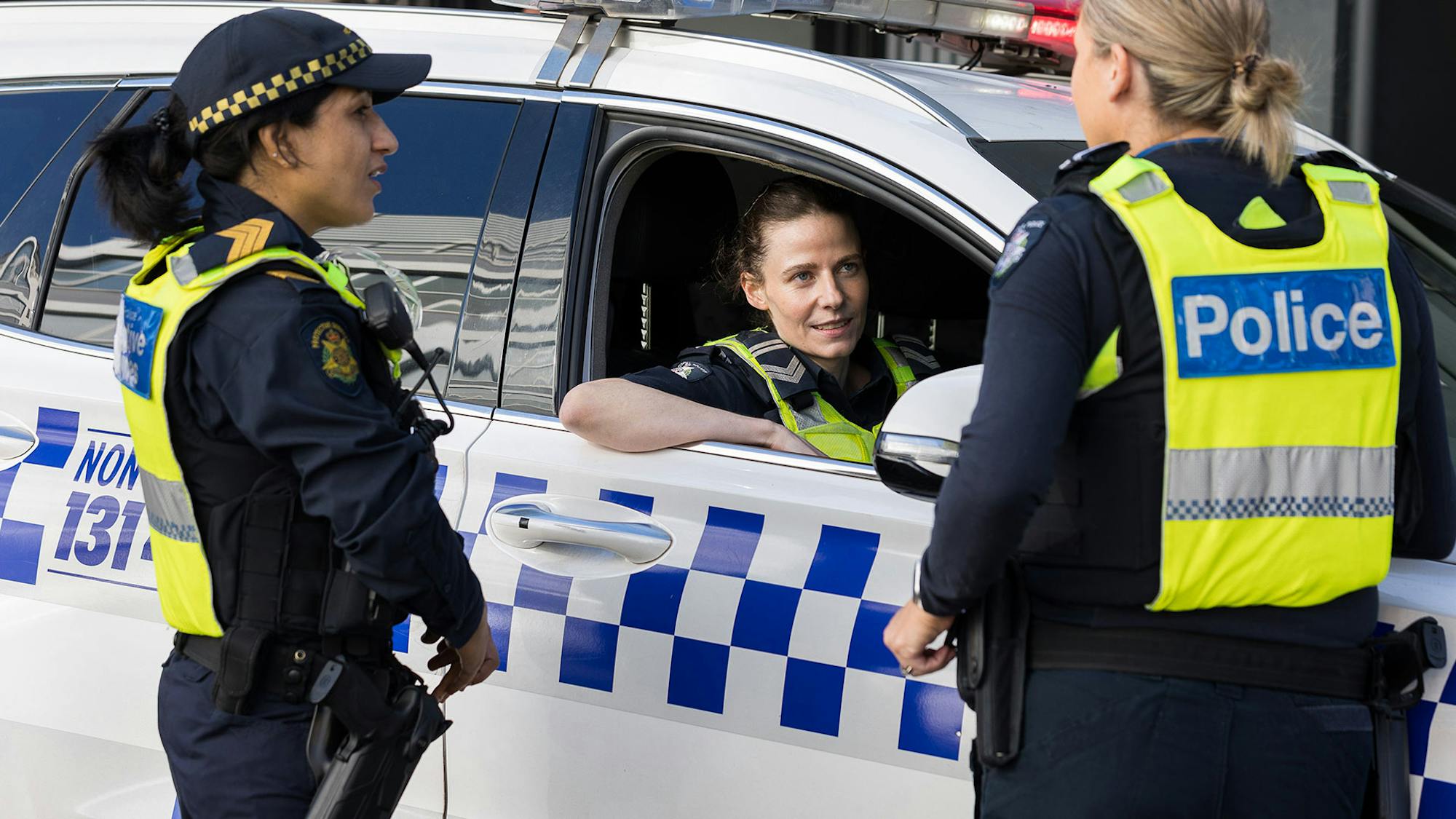 Special offers for police page, this image shows police officers having a chat