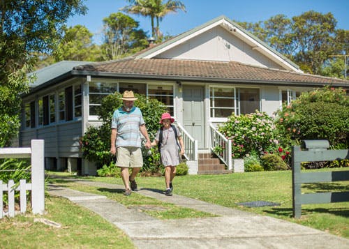 Understanding premiums - person walking with a child