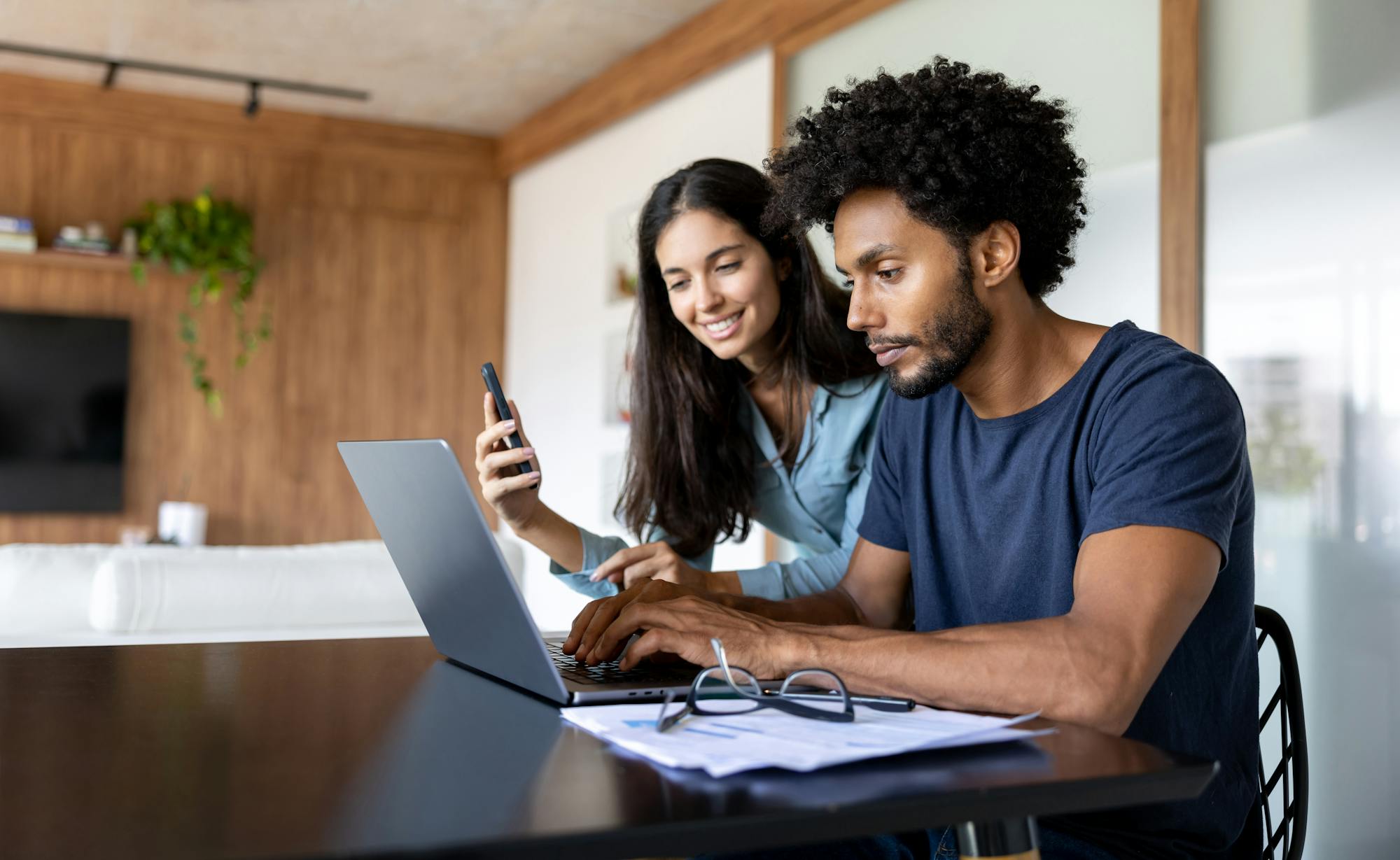 Couple paying off mortgage