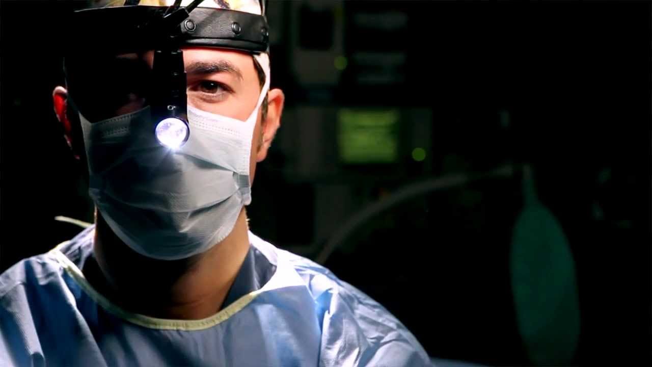 Dr. Corrado with Surgical Light and Mask