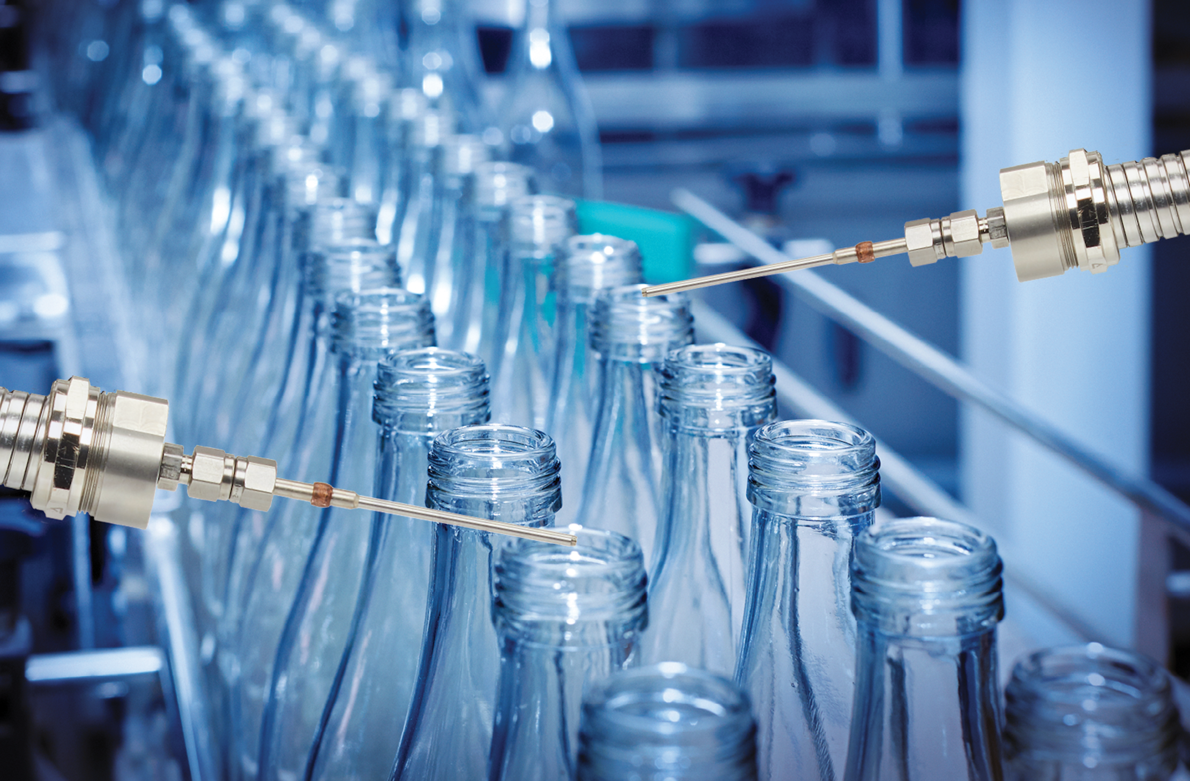 Cambustion FID50 sampling from above bottles passing by on a production line