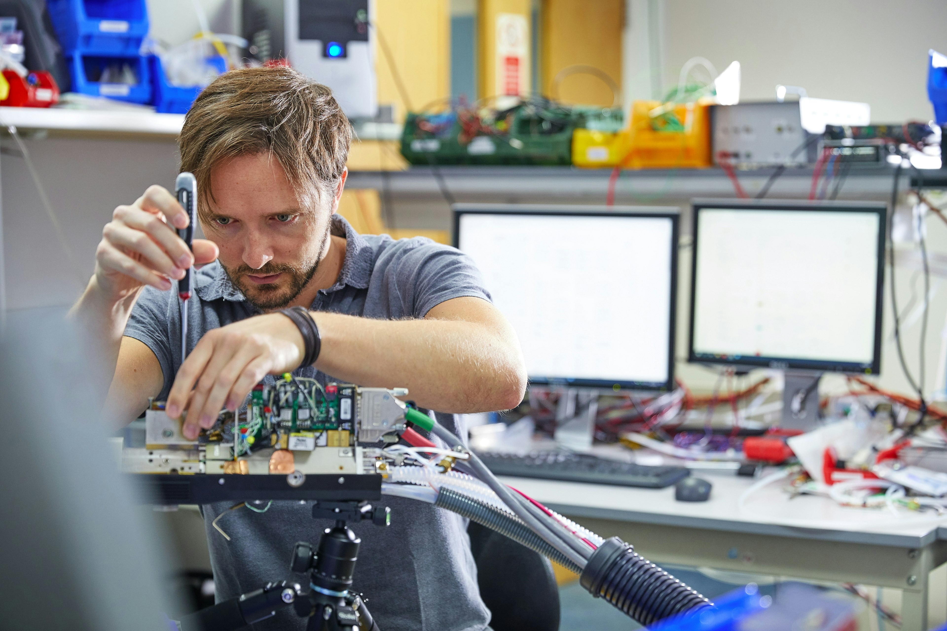 Cambustion engineer working on FID600 head with cover removed