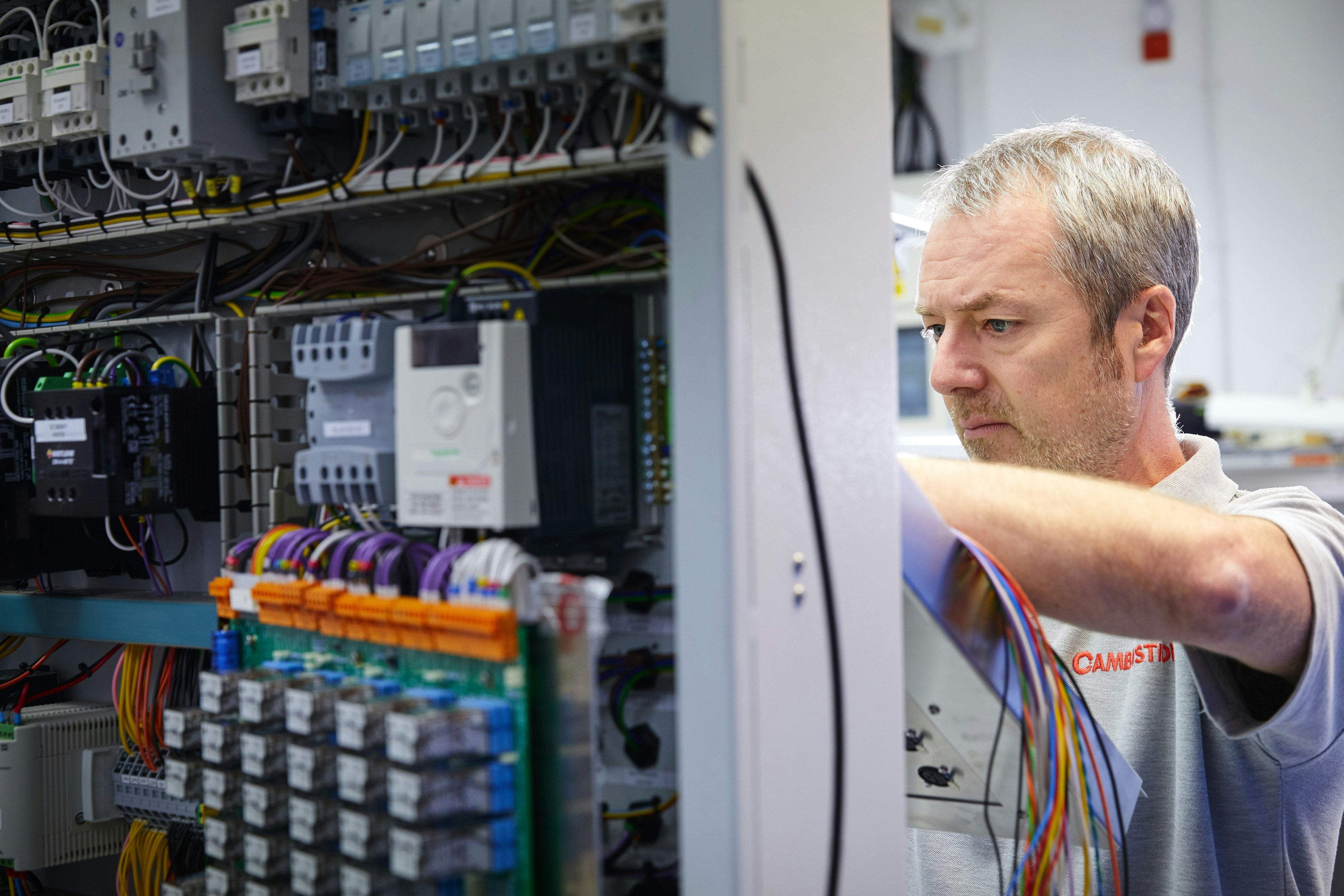 Cambustion test technician working on DPG wiring