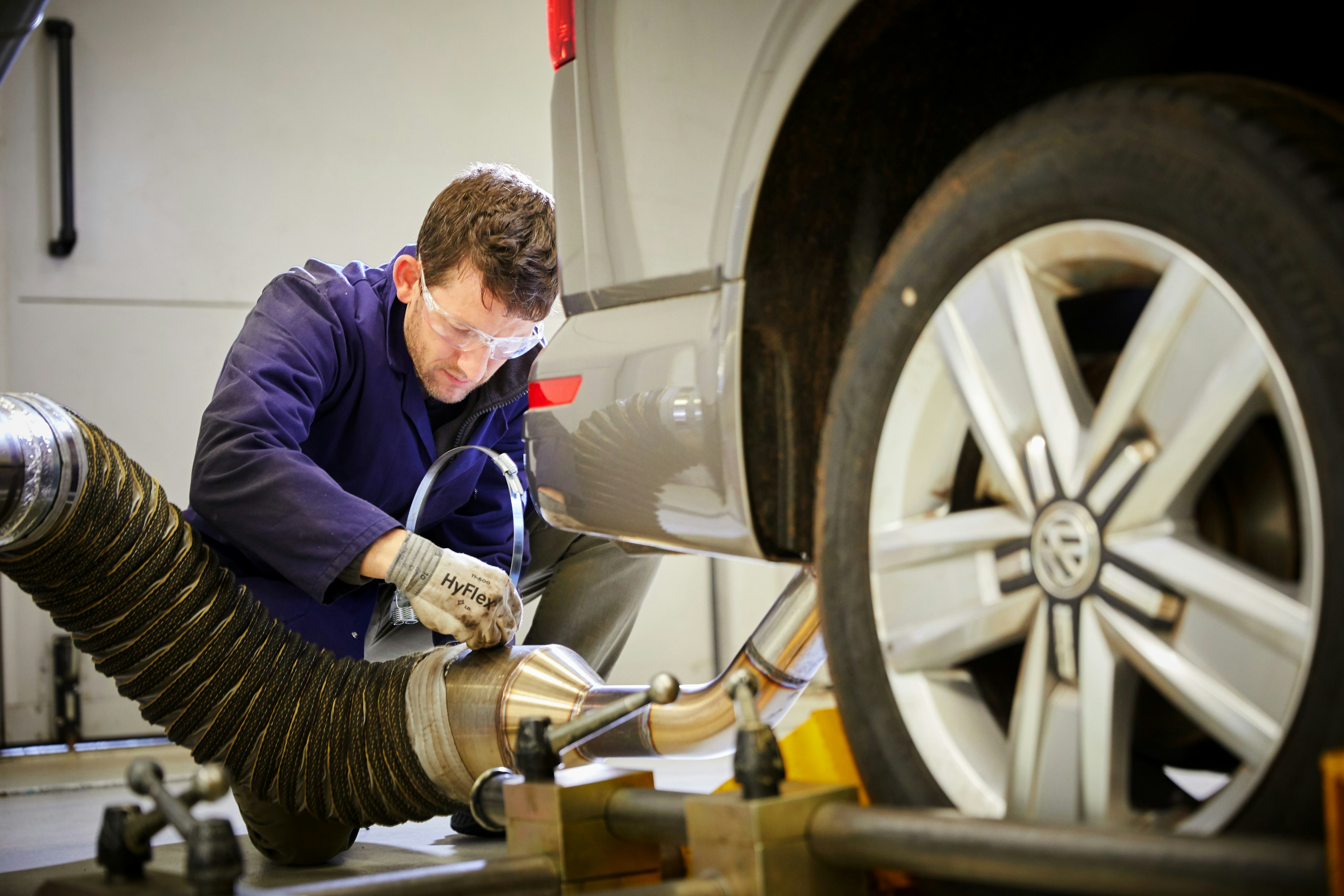 Cambustion engineer connecting CVS system to tailpipe