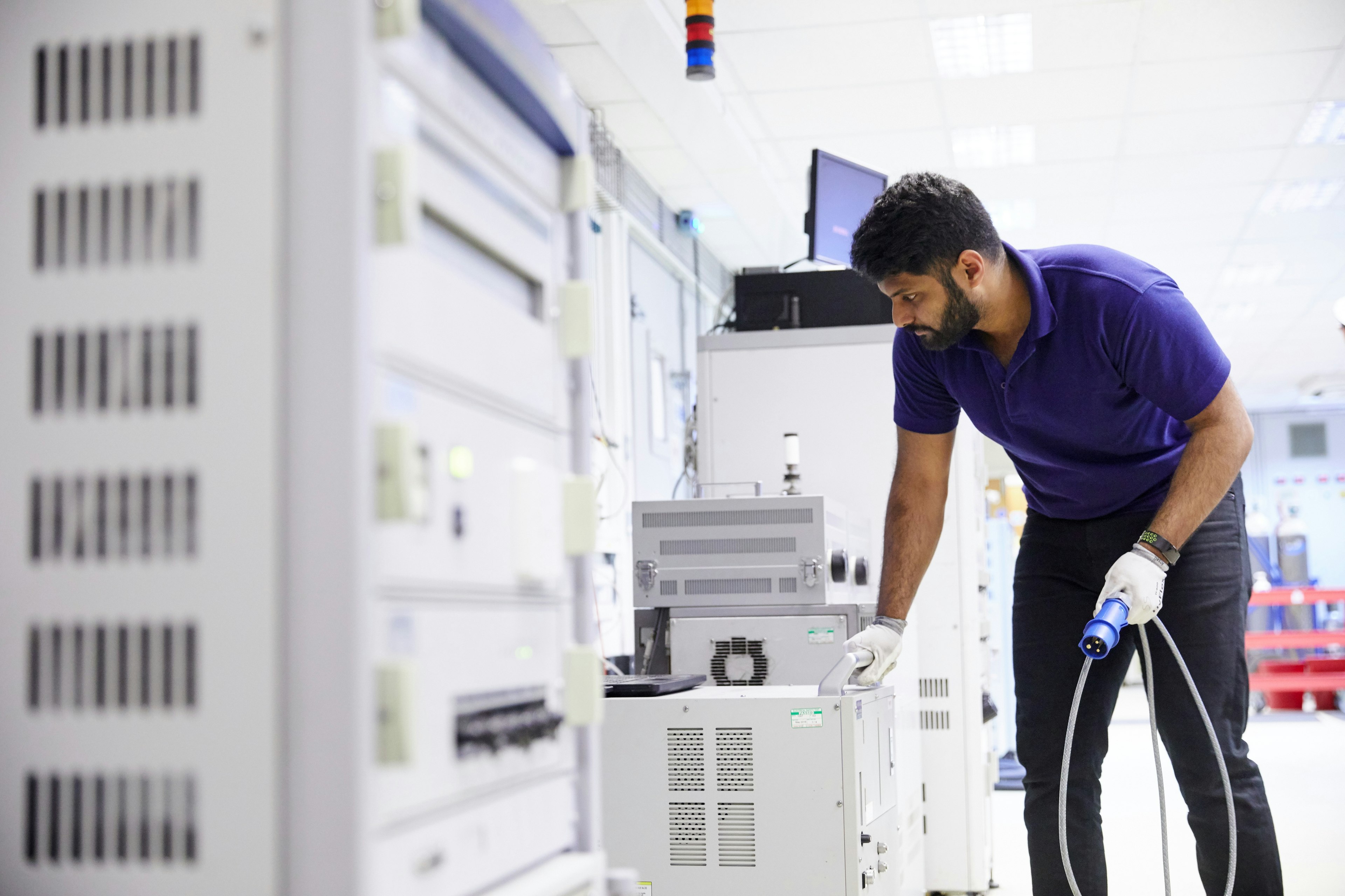 Engineer working on test cell analyzers