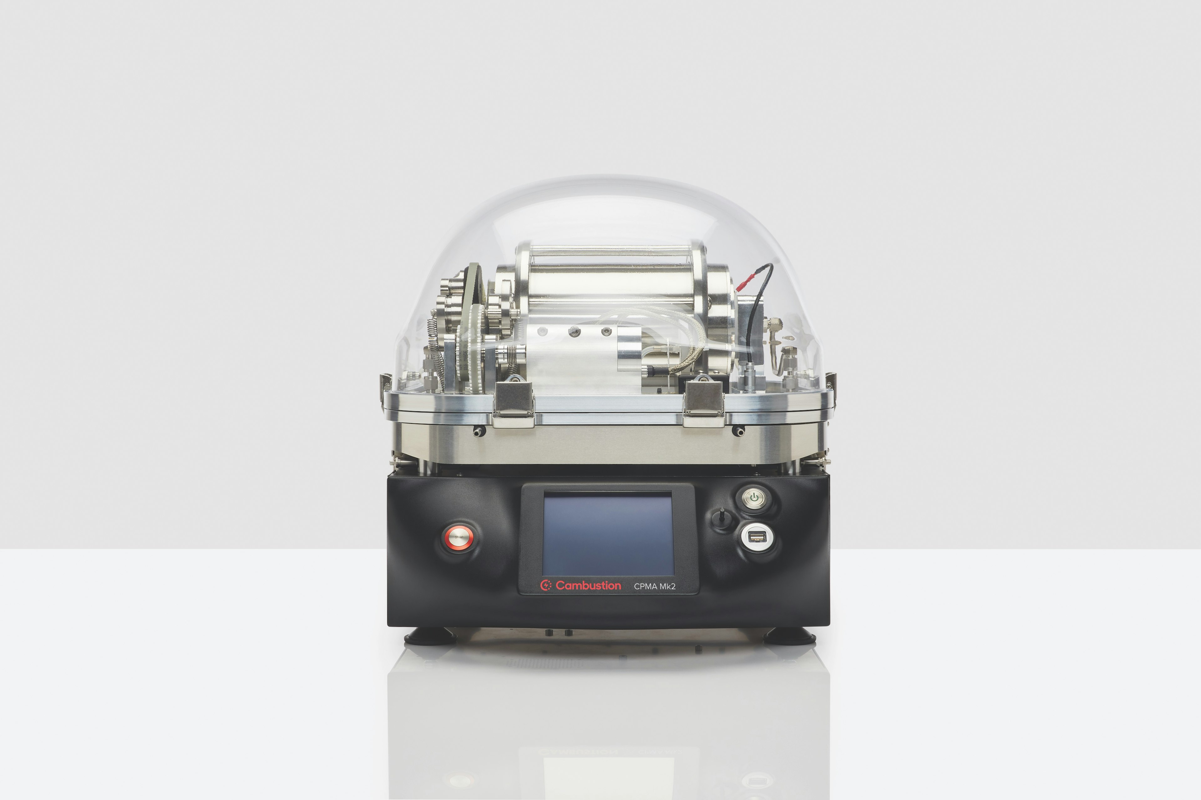 Cambustion CPMA front view showing touchscreen and operation buttons, transparent top showing centrifuge