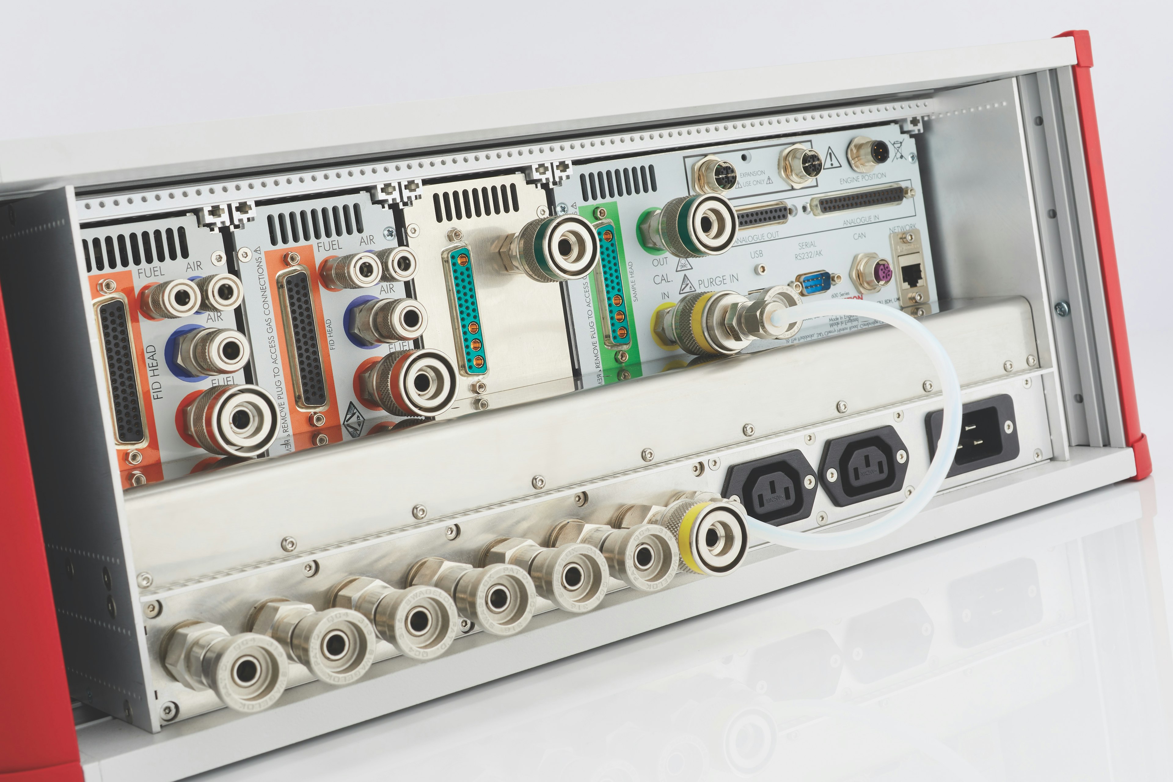 Rear of Cambustion FID600 cabinet showing gas fittings and module connections