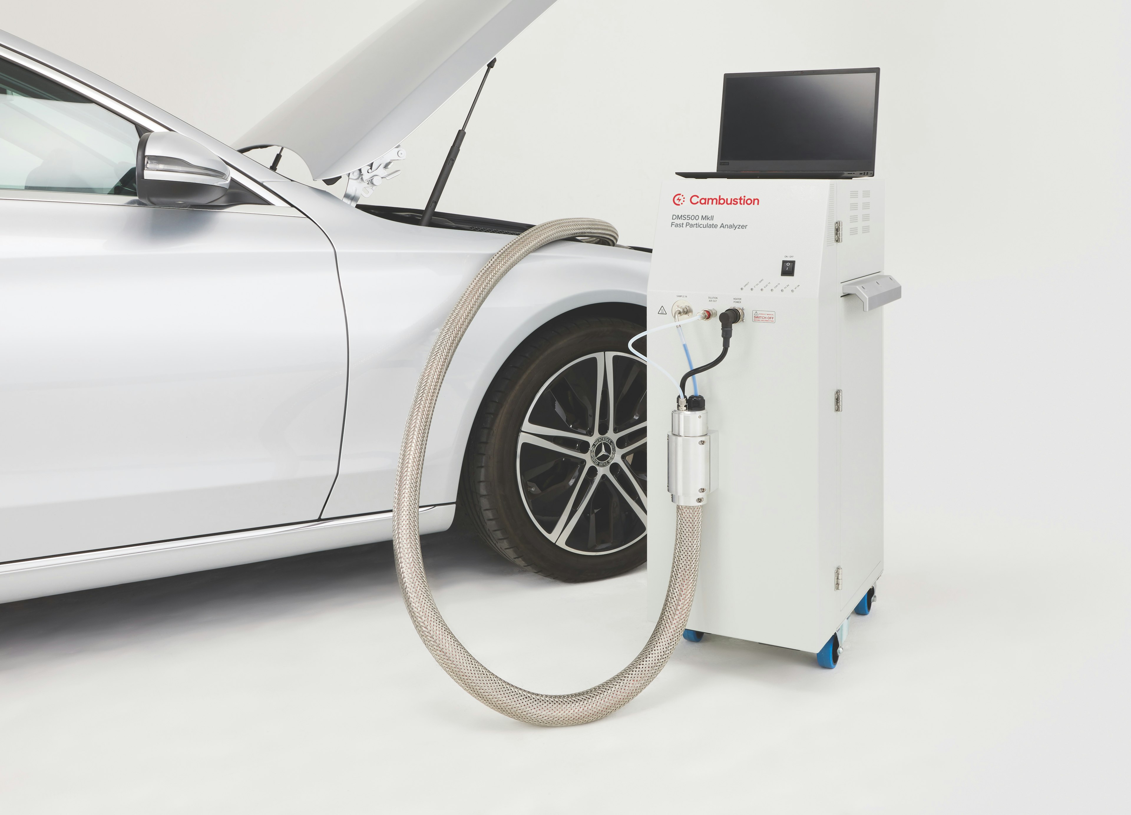 Cambustion DMS500 sampling in vehicle engine bay with laptop for instrument control and data collection