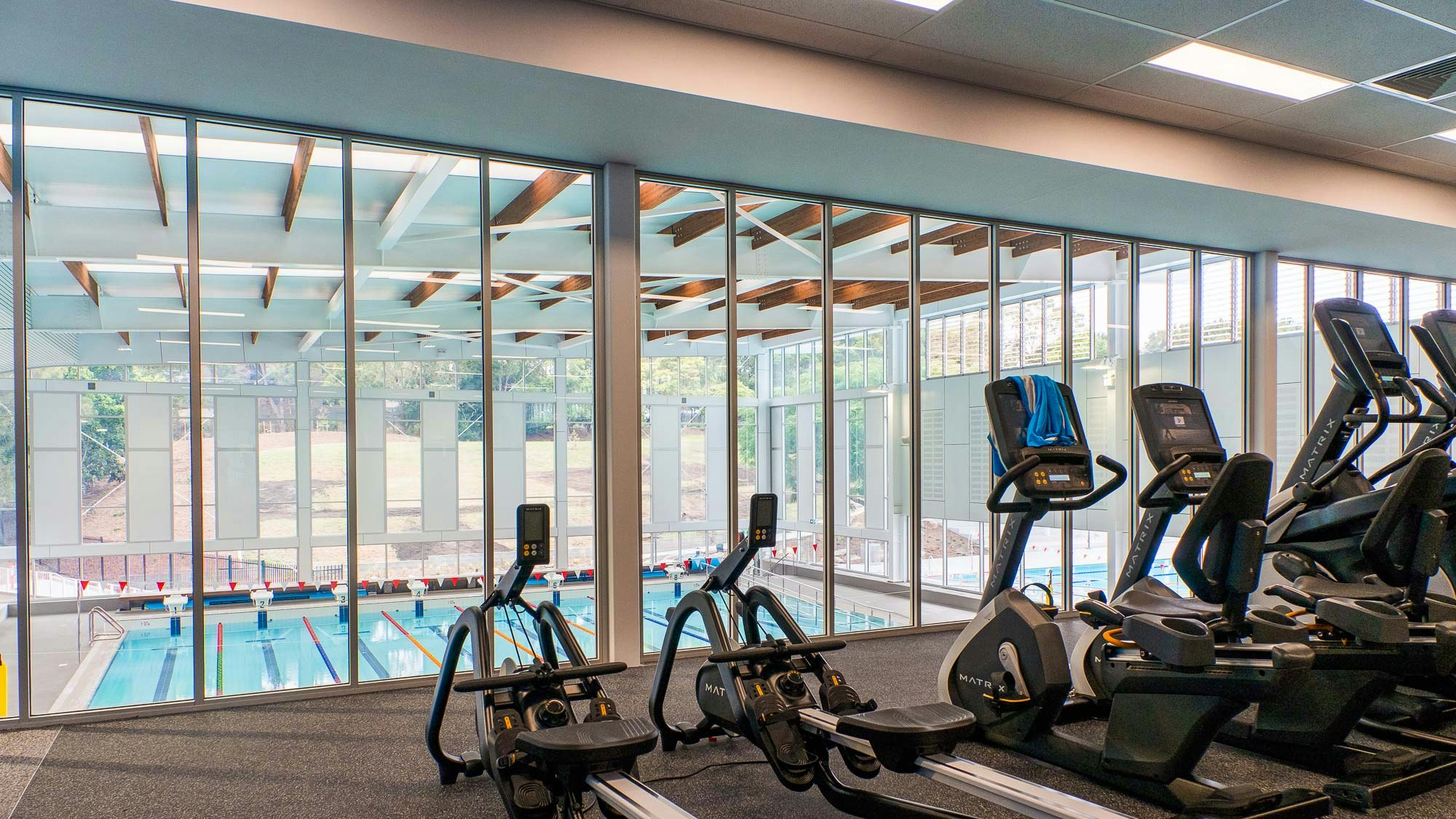 gym overlooking pool