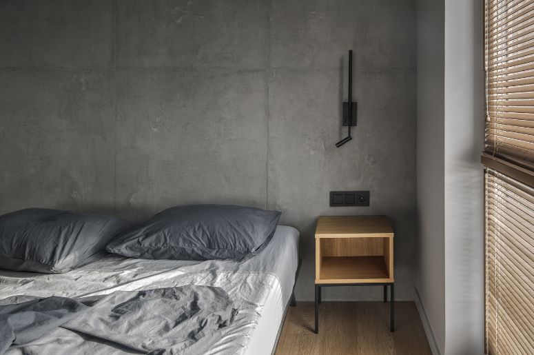 Quarto com parede de cimento queimado