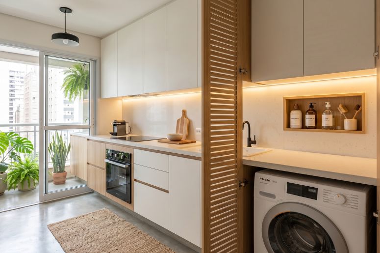 apartamento com lavanderia e cozinha planejada