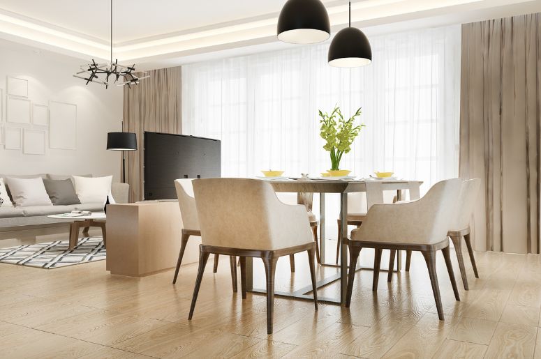 Sala de jantar integrada à sala de estar, com mesa, cadeiras e pendentes em ambiente moderno
