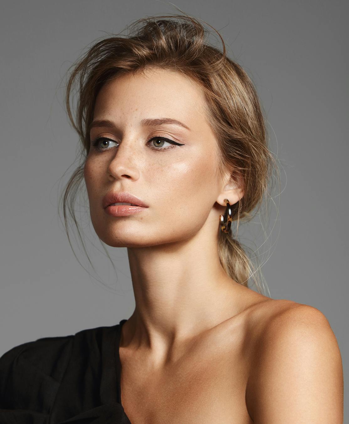 Beautiful woman with a very youthful looking face and neck.