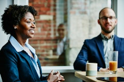 Business woman speaking in a meeting