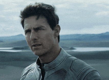 An animated GIF of Tom Cruise looking very confused