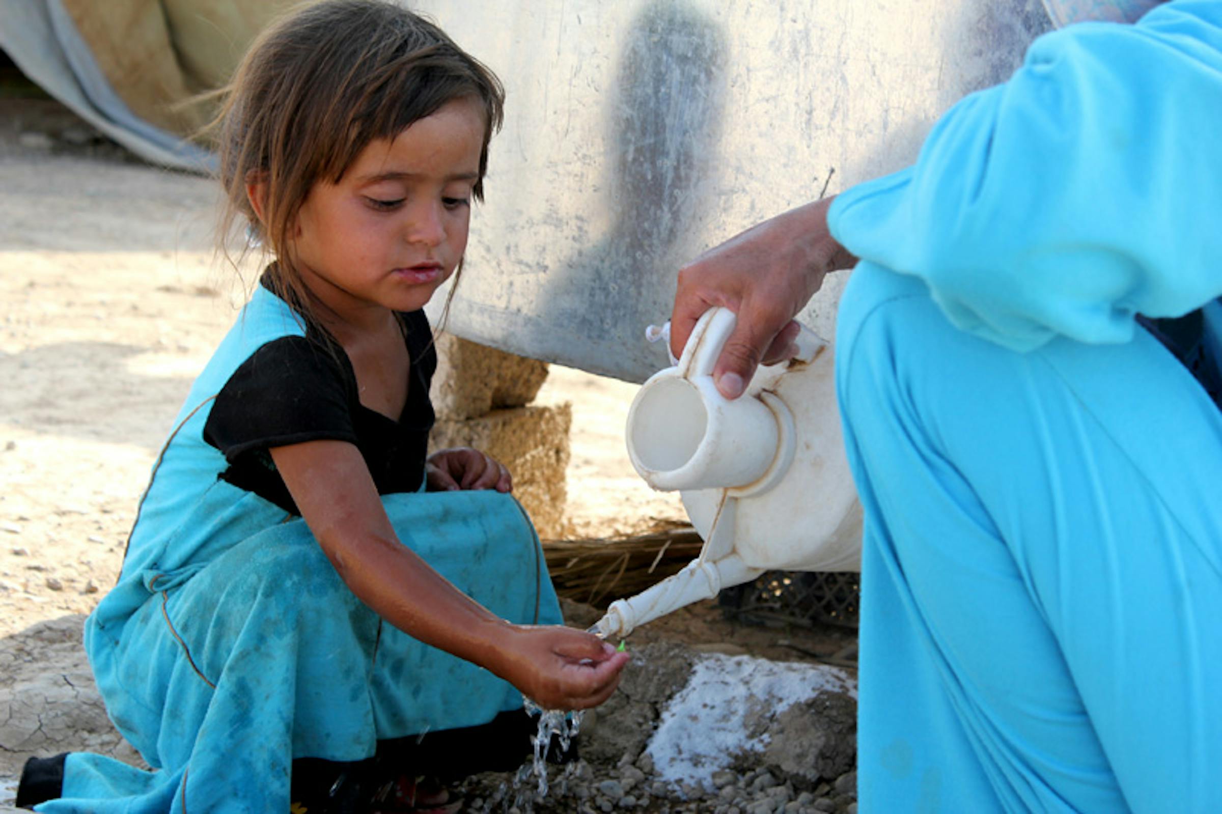 In questo campo profughi (Iraq) l'acqua arriva 3 volte a settimana grazie a un'autocisterna - ©UNICEF Iraq/2012/Abdulmunem