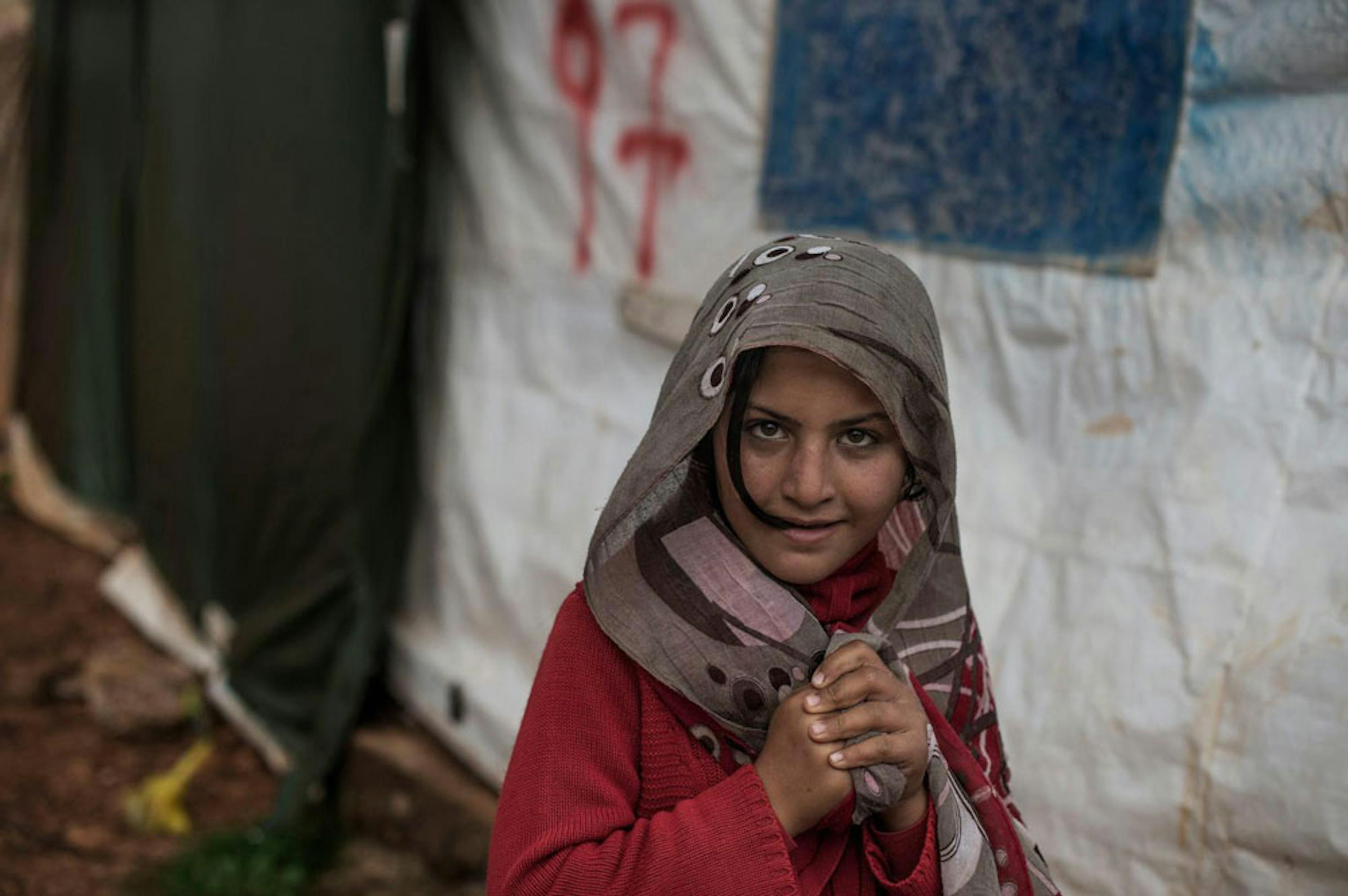 Una bambina siriana nel campo profughi di Marj El Khokh, in Libano - ©UNICEF/MENA2014-0010/Romenzi