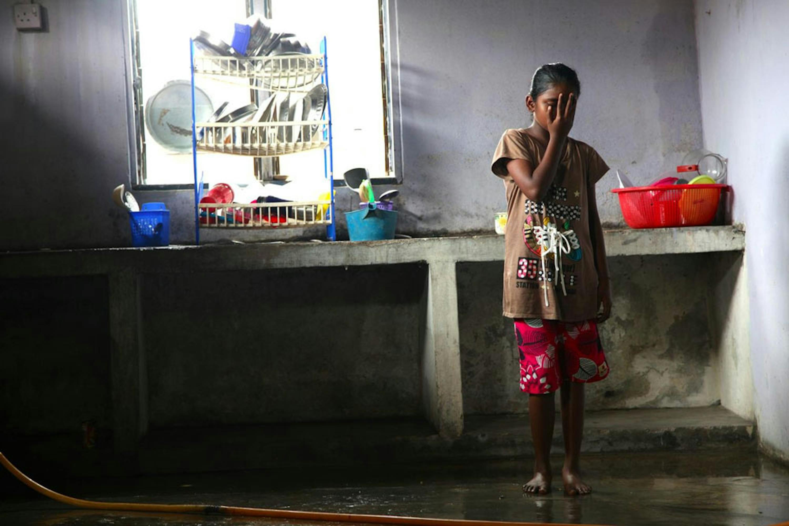 Una bambina di 8 anni di Banting (Malesia), vittima di abuso sessuale in famiglia. Il suo caso è seguito da un'assistente sociale formata dall'UNICEF - ©UNICEF/NYHQ2014-3574/Pirozzi