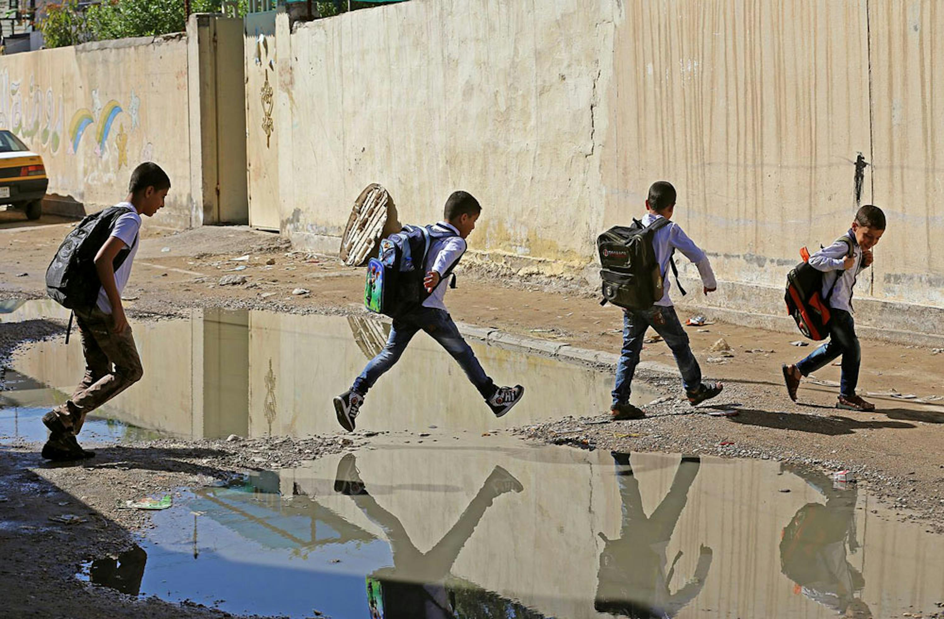 Strade allagate e fogne saltate a Baghdad e in altre zone dell'Iraq: condizioni che favoriscono l'espandersi del colera - ©UNICEF Iraq/2015-0323/Khuzaie