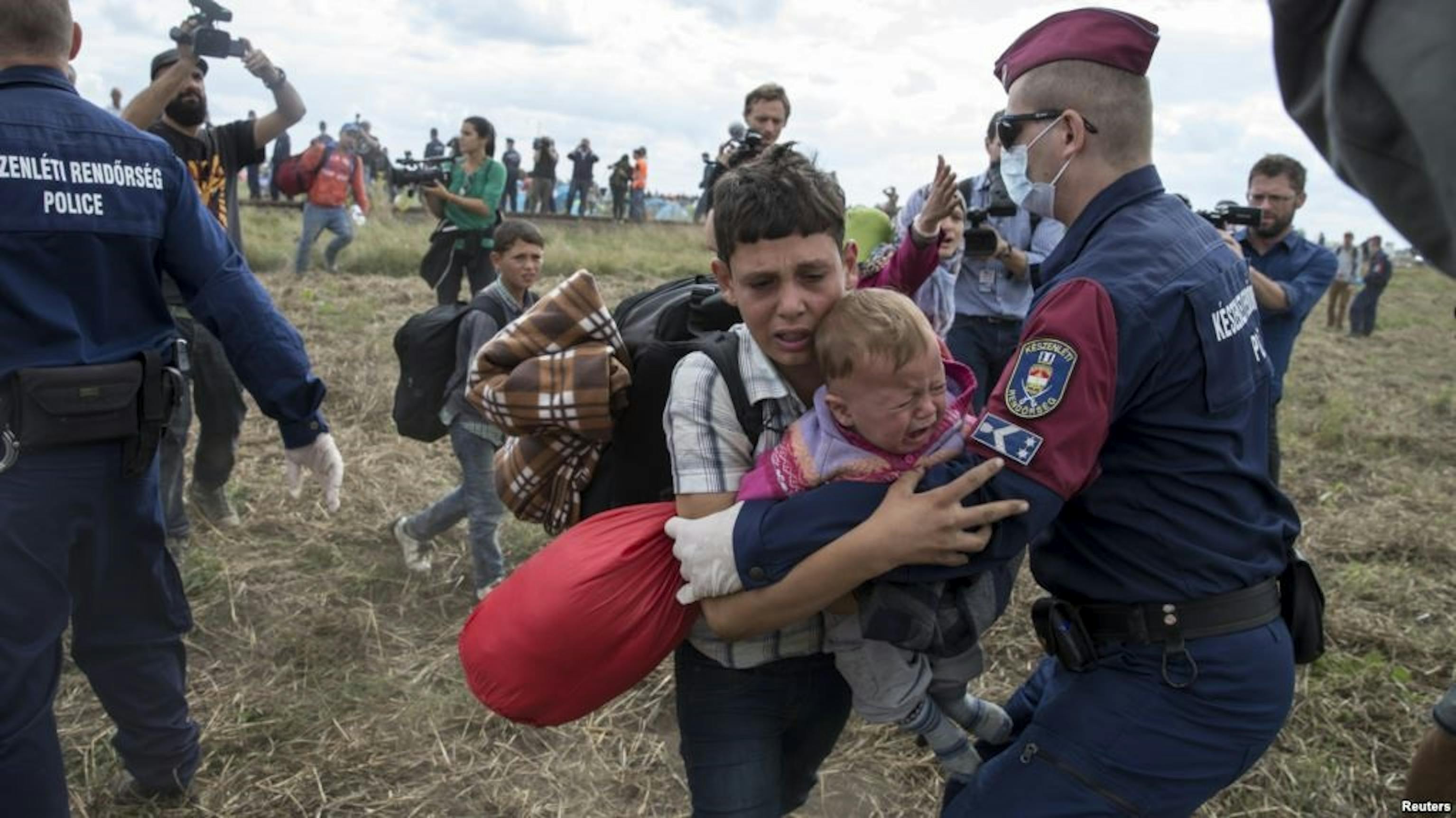 Migranti alla frontiera con l'Ungheria (settembre 2015) - ©Reuters 