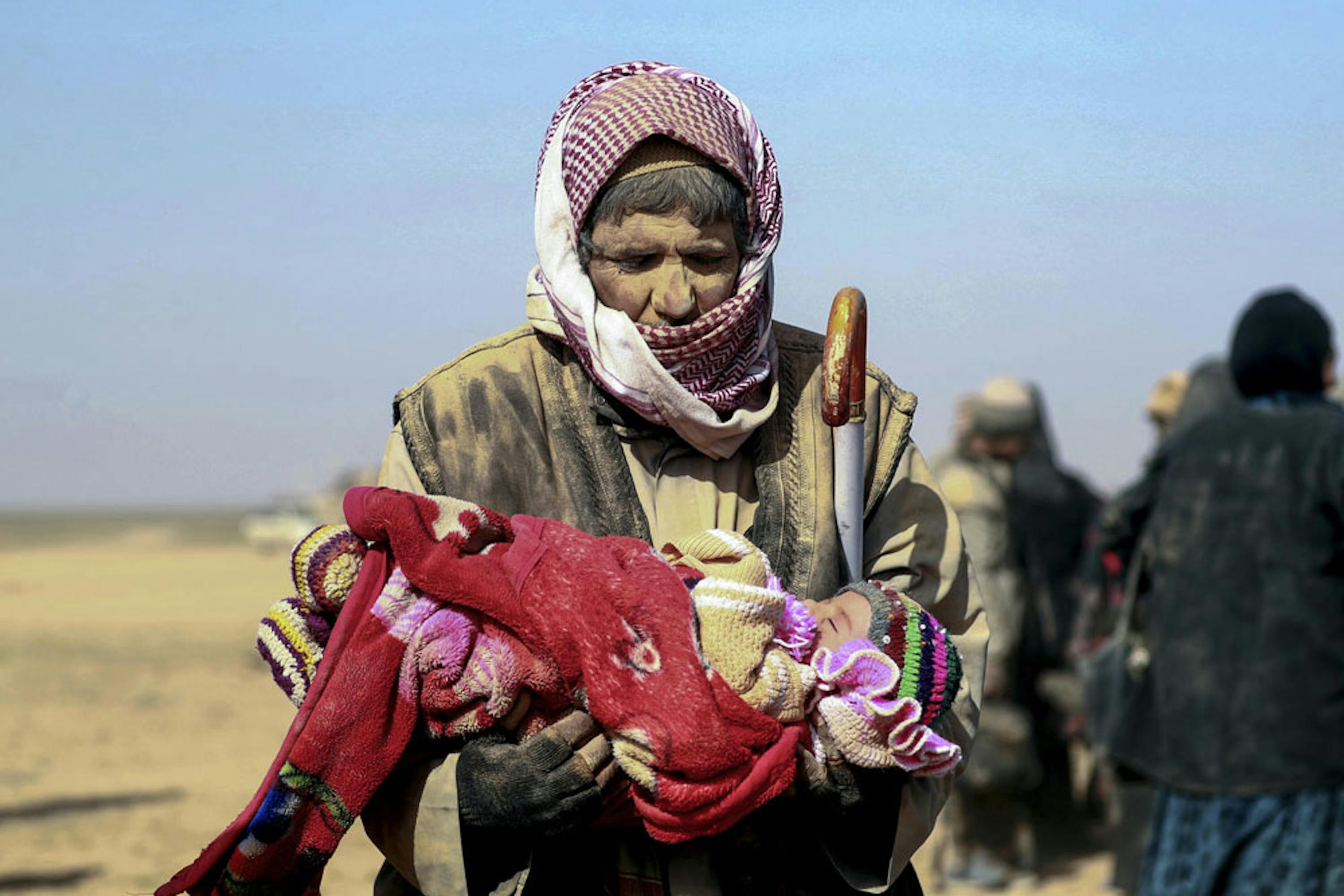 Padre e figlio durante uno sfollamento a seguito dei combattimenti nel nord-est della Siria, gennaio 2019 - ©UNICEF/UN0277722/Souleiman