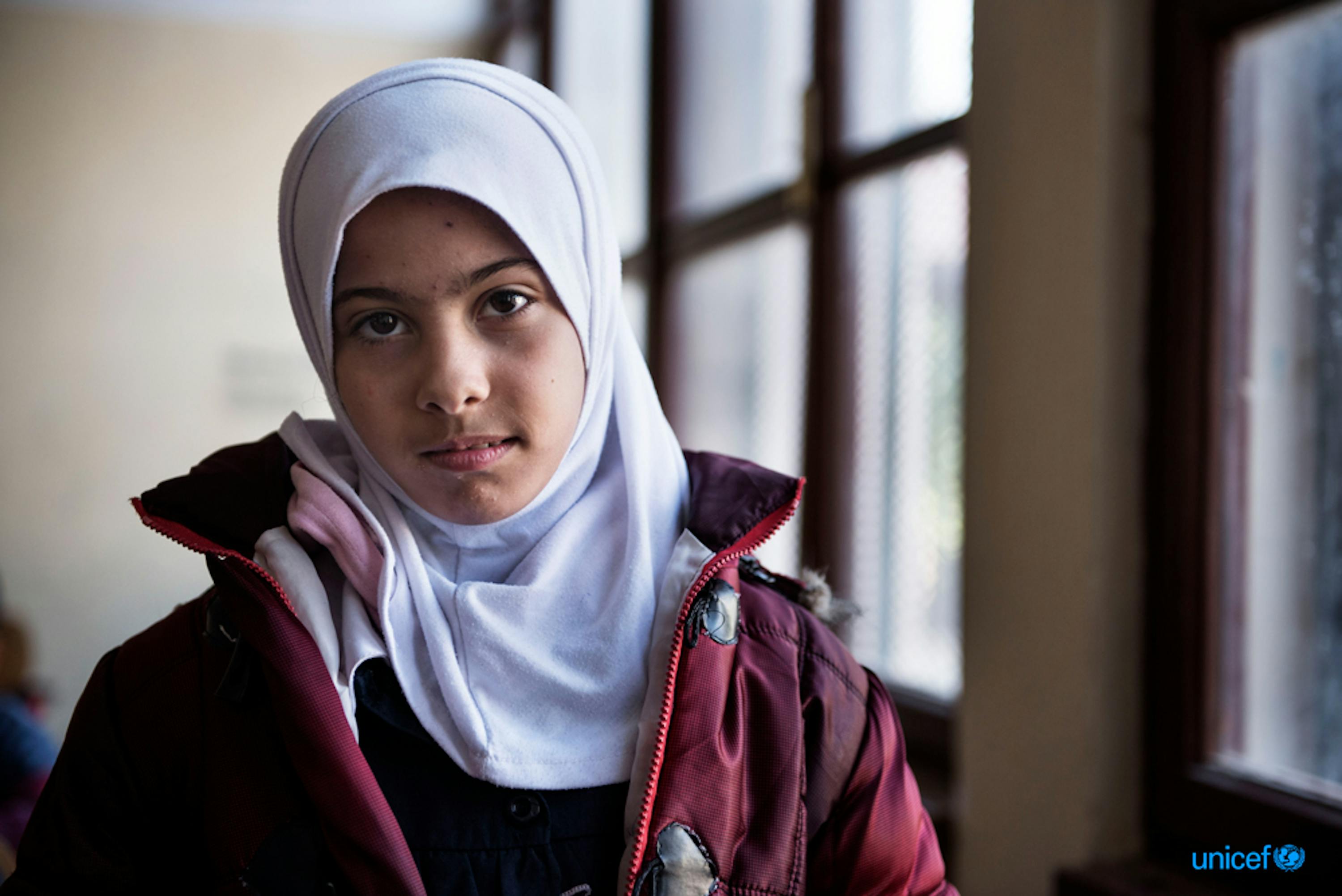 Libia, Tripoli - Nada, una bambina di nove anni, nell'aula della scuola El Hadana di Zanzur, 