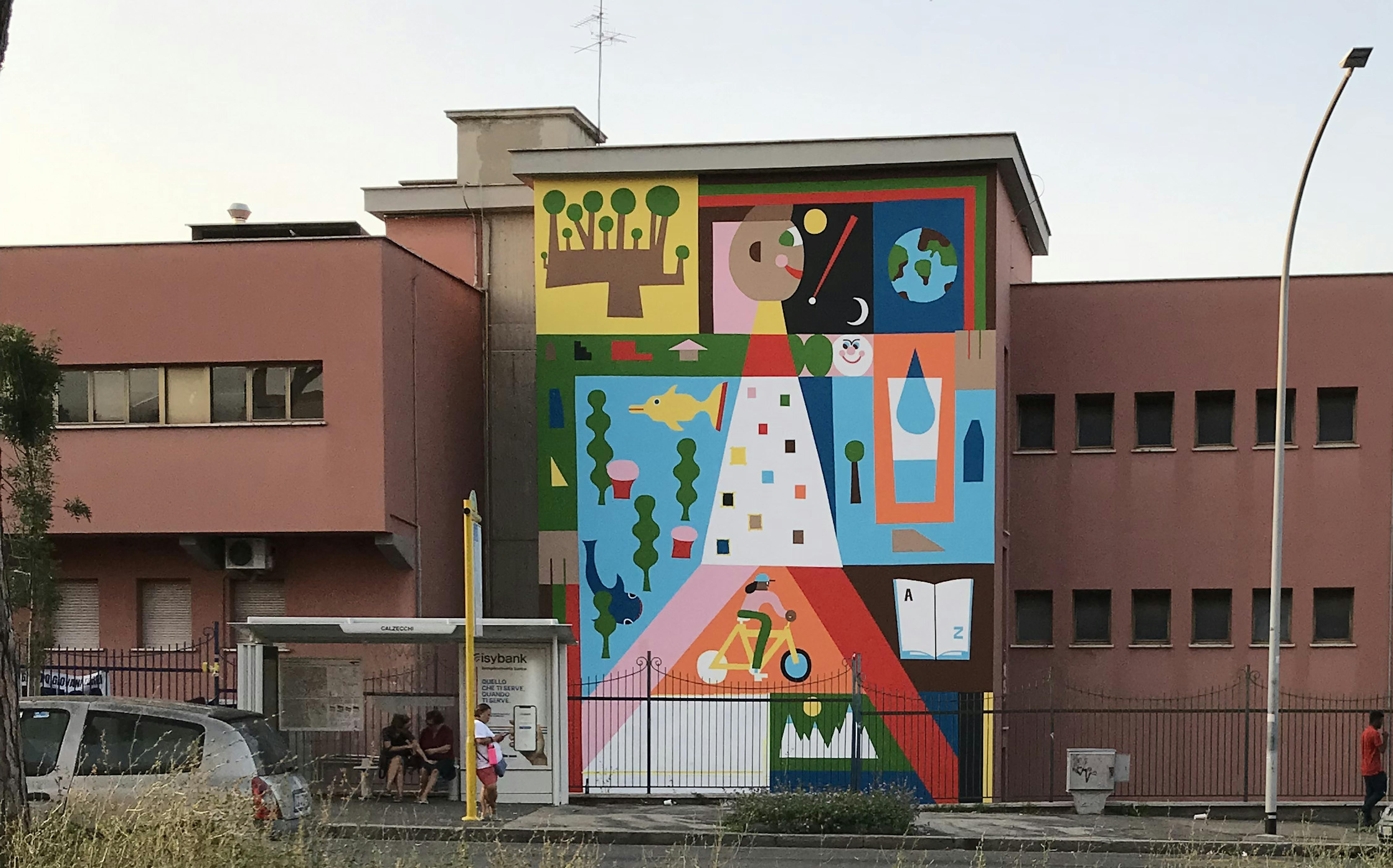 L'eco-murales realizzato dallo street artist Geometric Bang sulla facciata della sede della Fondazione ENGIM nel quartiere S. Paolo a Roma - © Yourban2030