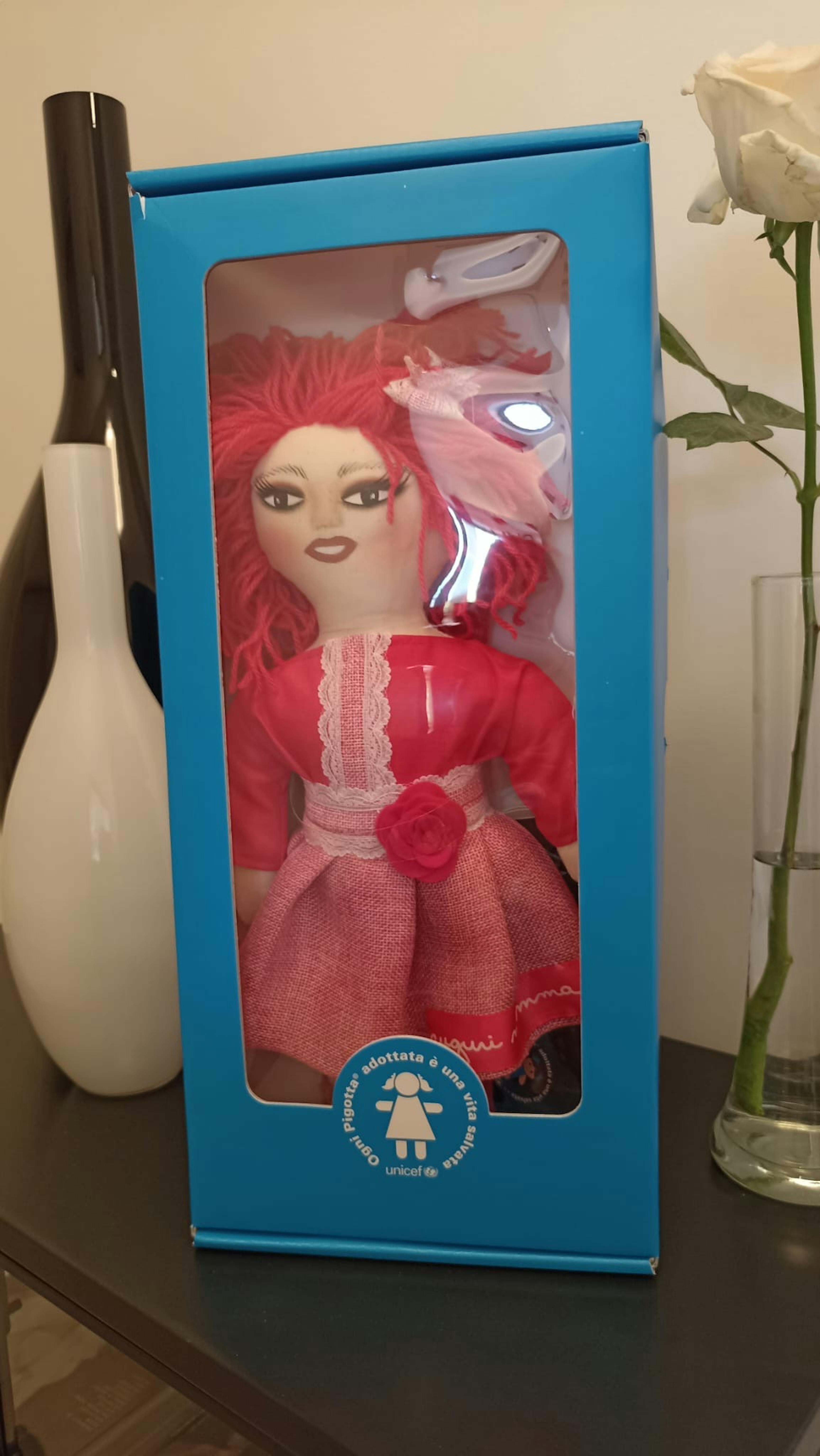 una delle pigotte in rosa