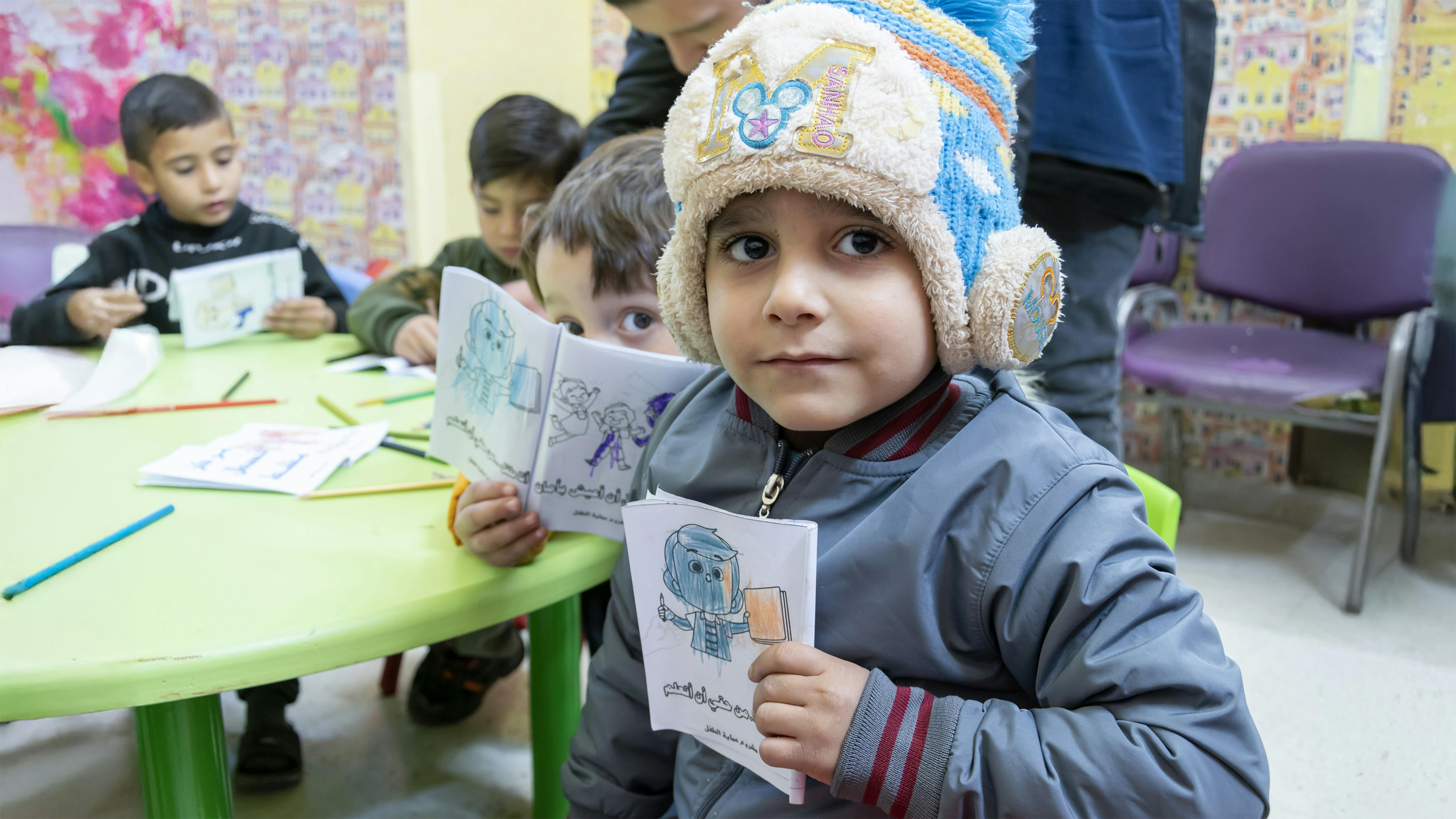 Siria - Ghaith, 6 anni, partecipa a una sessione di supporto psicosociale in un centro di protezione dell'infanzia supportato dall'UNICEF nella città di Aleppo