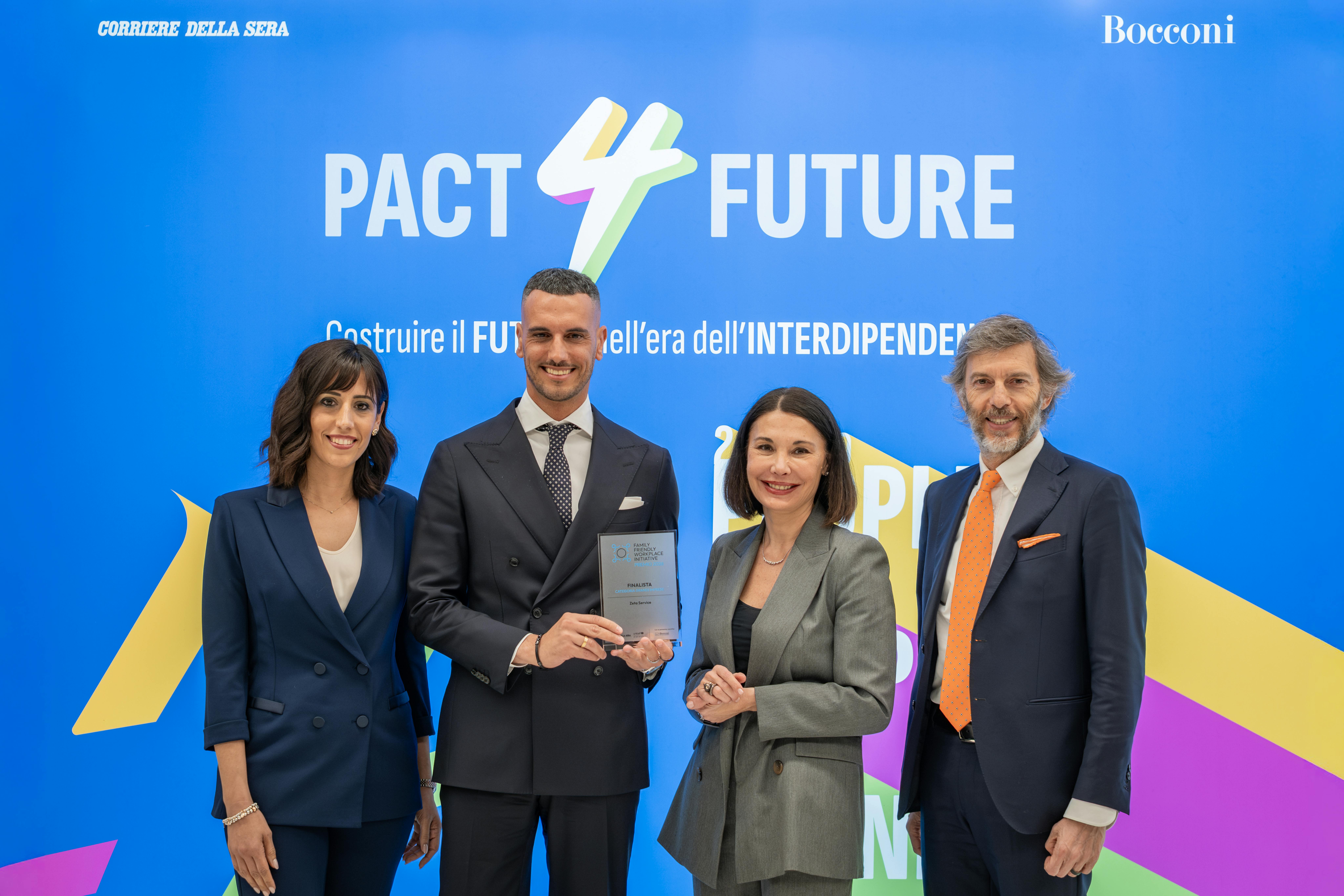 Per Zetaservice, Debora Moretti  Co-Owner & CEO Zeta Service e Ivan Moretti, Co-Owner & CEO Zeta Service ricevono da Stefania Radoccia, UNICEF Italia e  Francesco Perrini, SDA BOCCONI School of Management,  il premio di finalista Grandi Aziende. ​