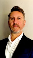 Headshot of John Coules