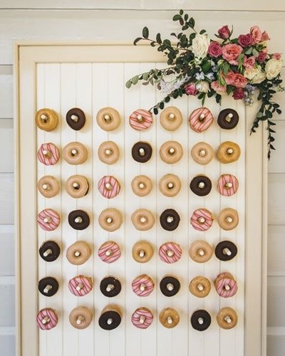 Donuts on a wall for guests to help themselves