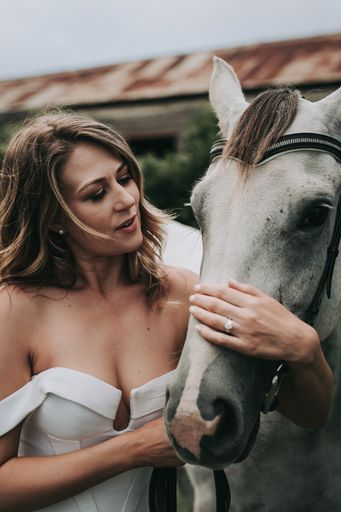 Bride poses with grey mare