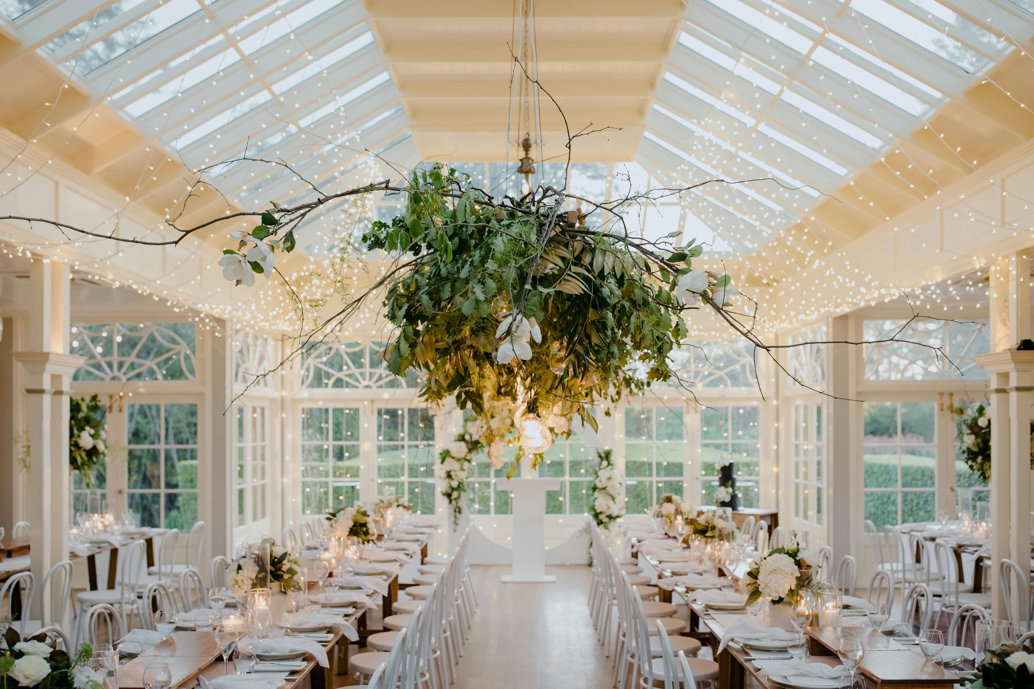 Fairy light and floral wedding installation