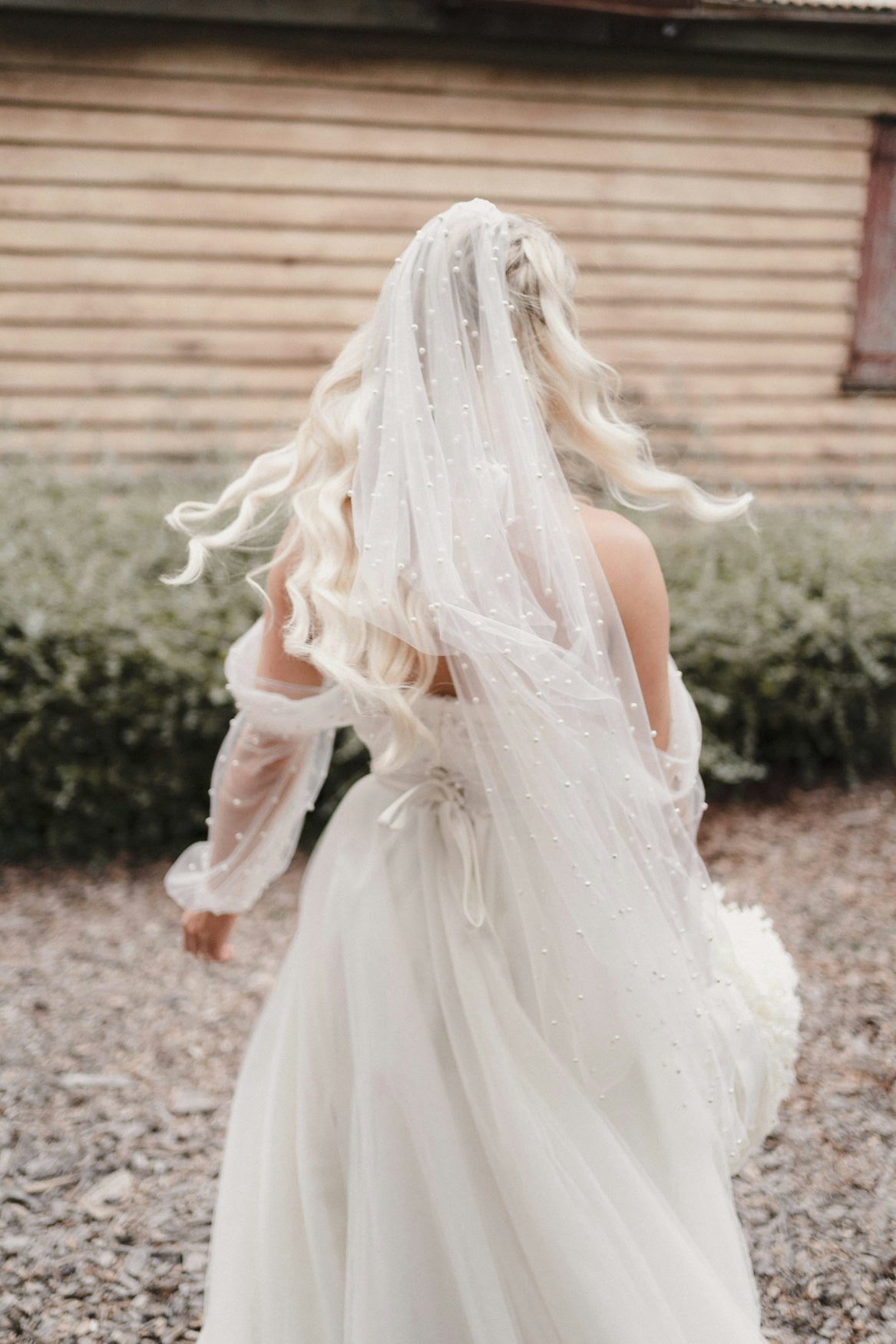 Bride twirling in dress 