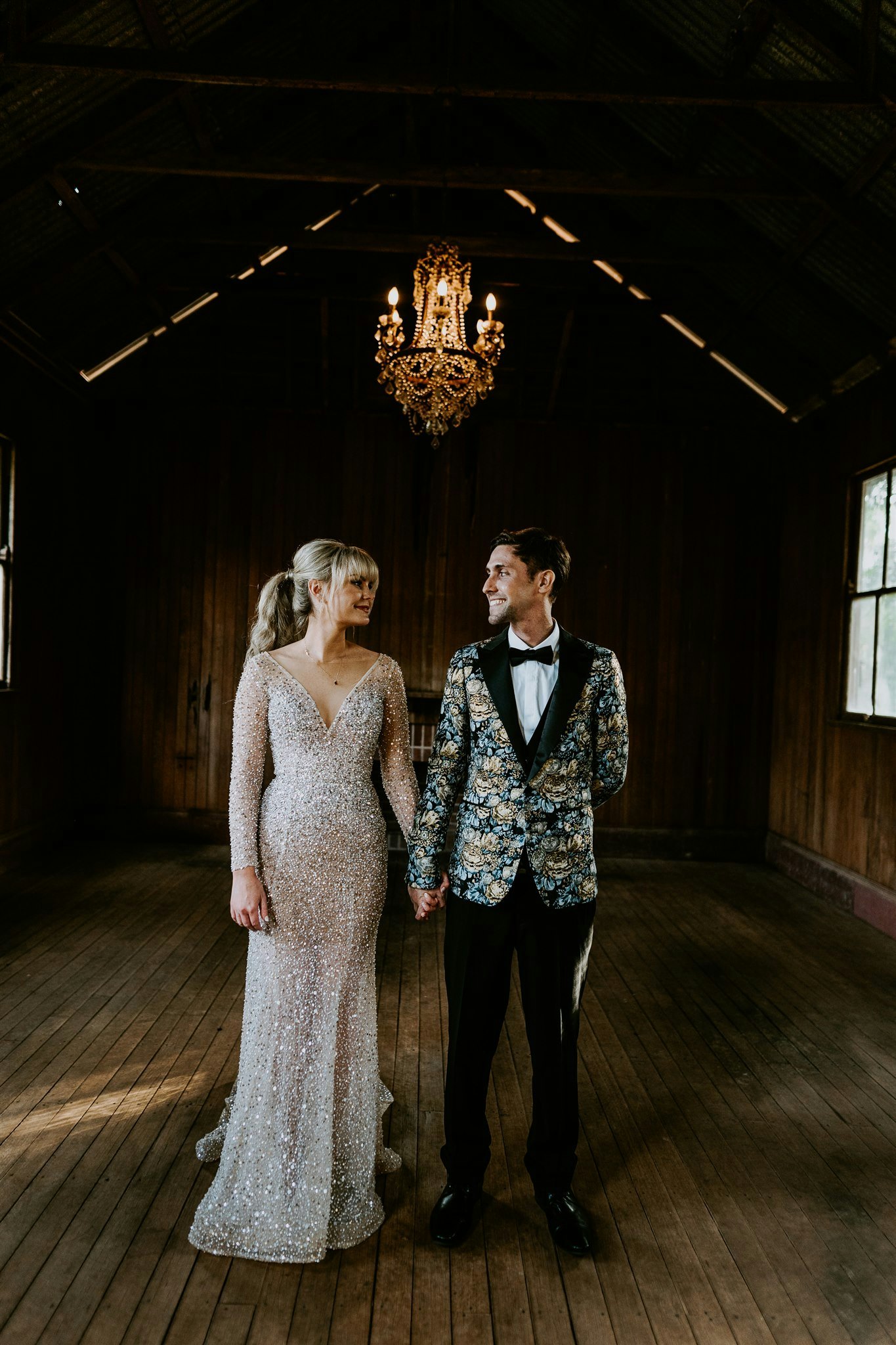 Bride and groom in old school house 