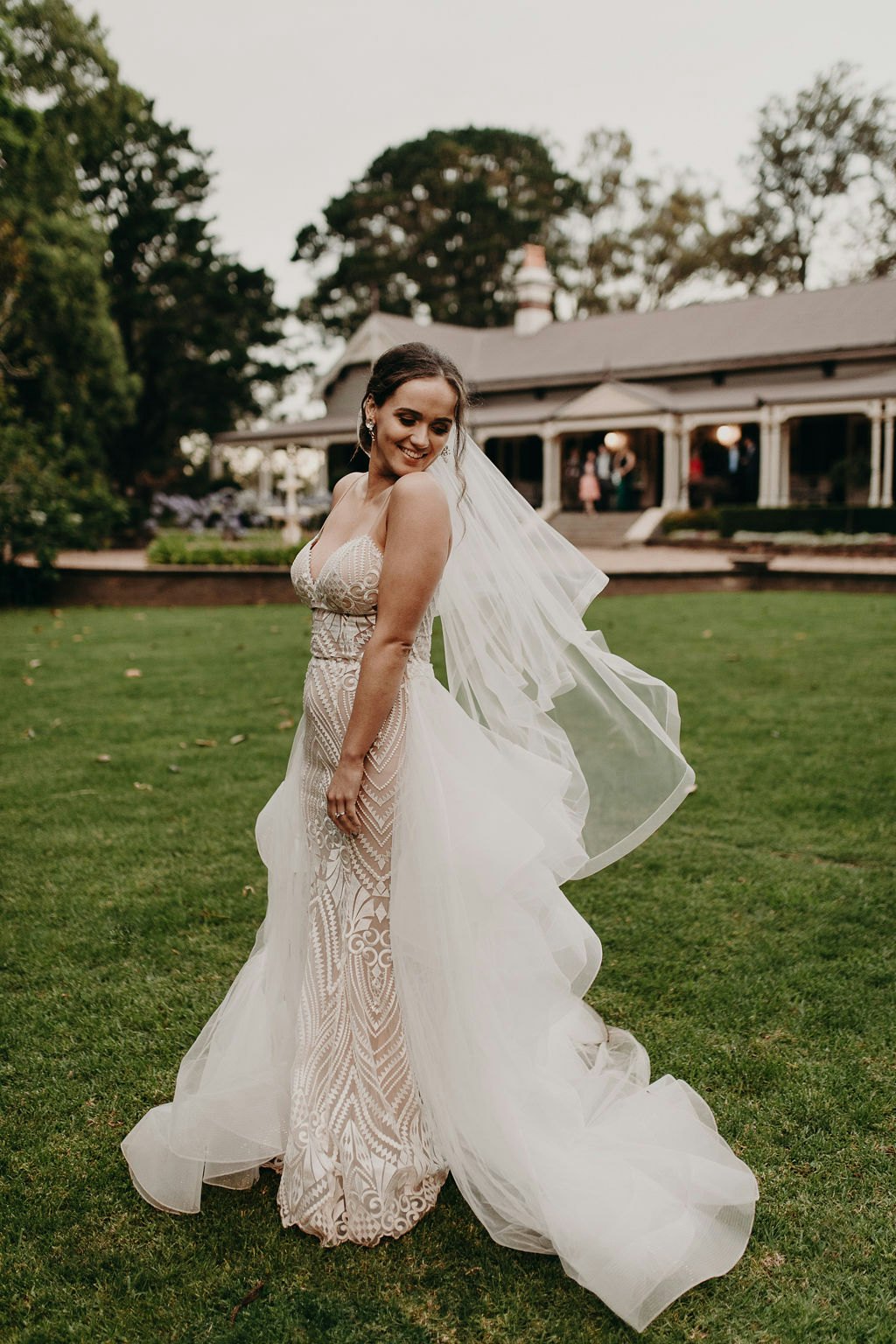 Bride twirling around in gown 
